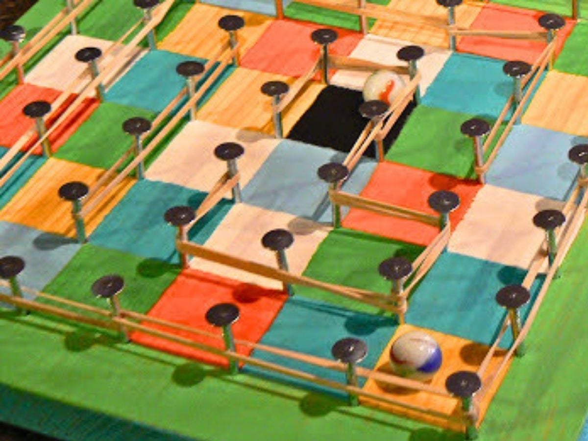 close up of geo-board marble run design project