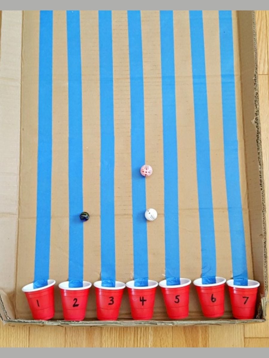 kid-made incline plane marble game board