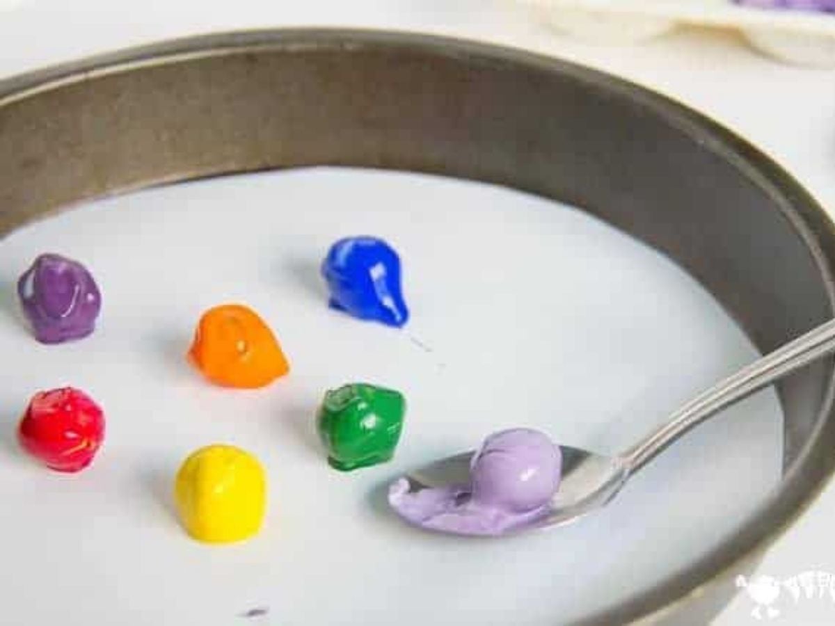 rainbow paint colors on marbles to paint a rainbow
