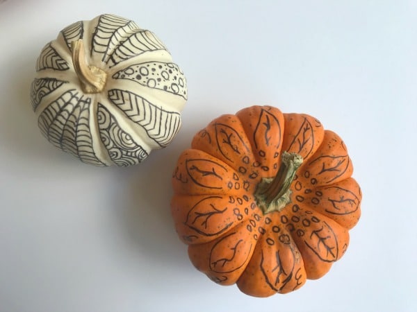 pumpkins decorated with markers