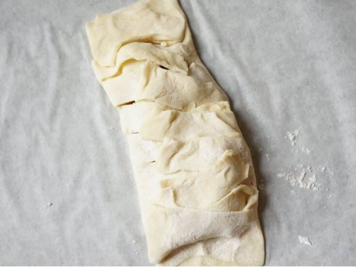 apple turnover with puff pastry shroud folded over