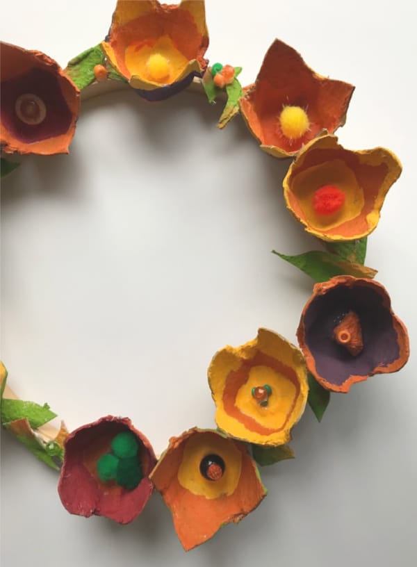 egg carton flowers on wreath close up