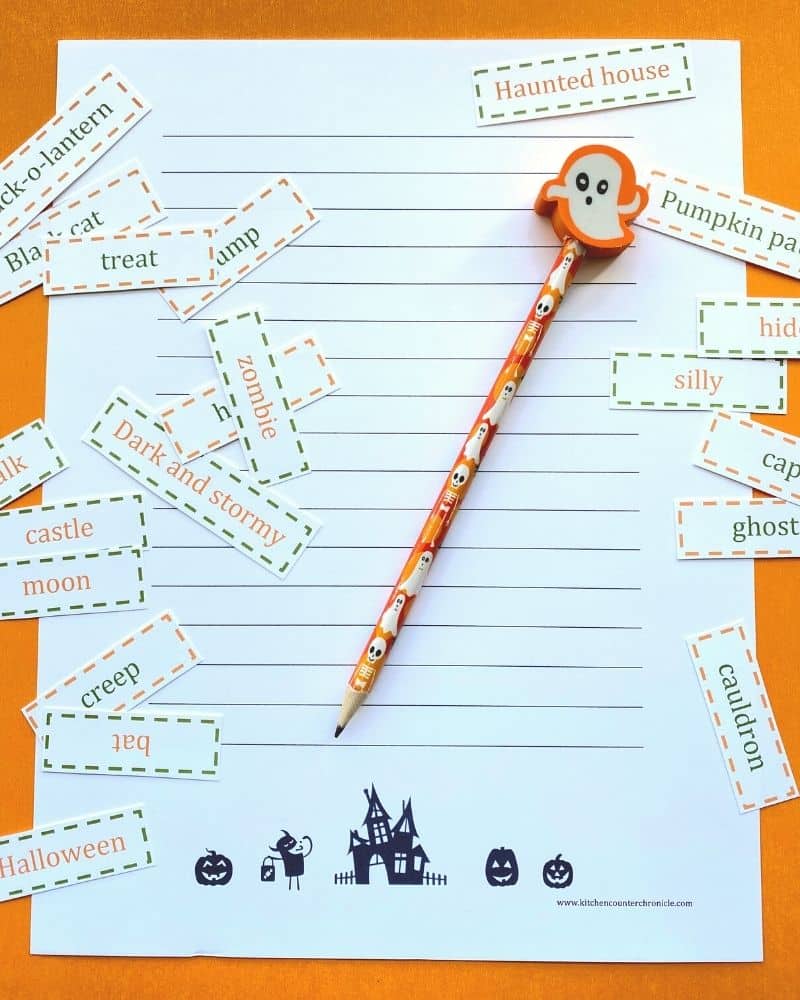 printable halloween writing paper for kids with ghost pencil and eraser