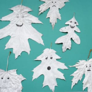 leaf ghosts painted with faces
