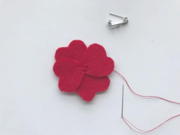 felt poppy pin with the petals sewn together
