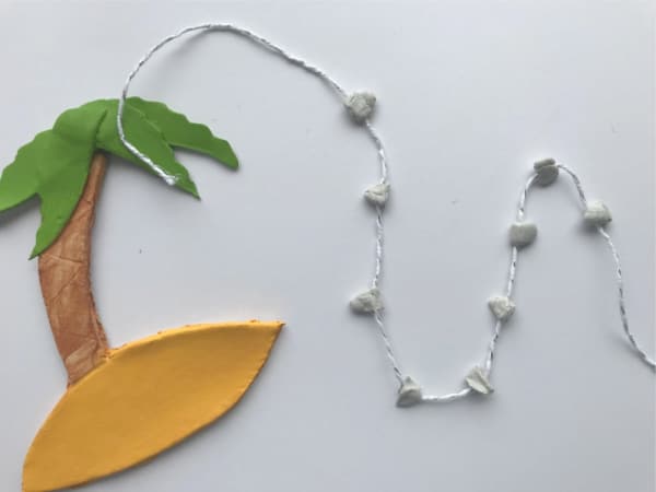 palm tree ornament with christmas lights