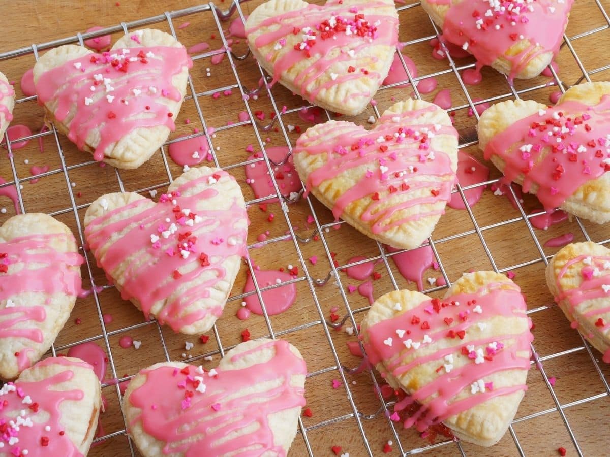 cooling rack with many valentines day heart shaped pop tarts