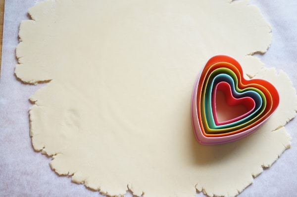 heart shaped cookie cutter on dough
