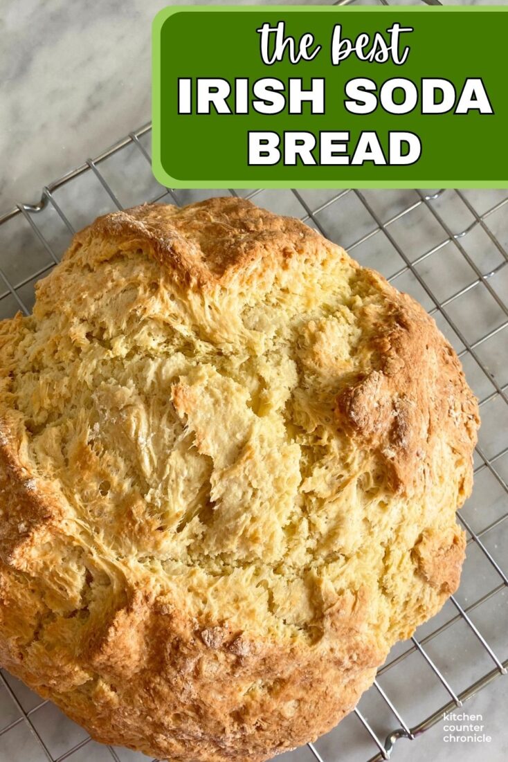 loaf of freshly baked irish soda bread on cooling rack with title the best Irish soda bread recipe