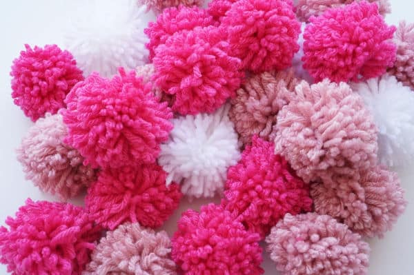 pile of pink pom poms