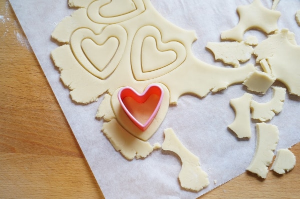 sandwich cookie dough with cookie cutters