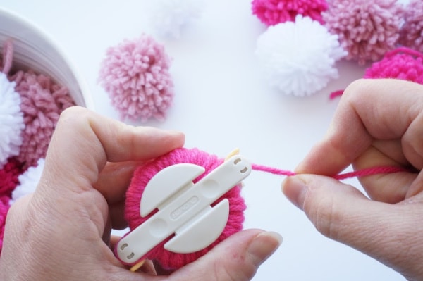 yarn wrapped on whole pom pom