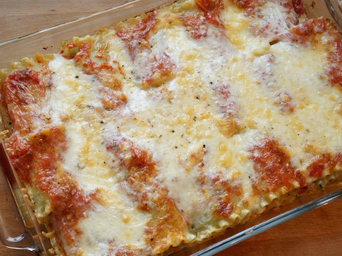 baked meatless lasagna rolls with browned cheese topping