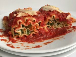 meatless lasagna rolls on plate