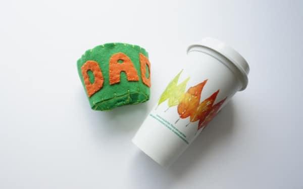 coffee cup cozie with reusable coffee cup