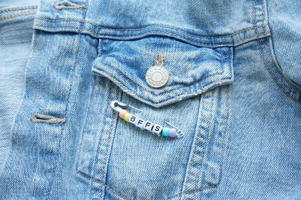 BFF friendship beads on jean jacket pocket