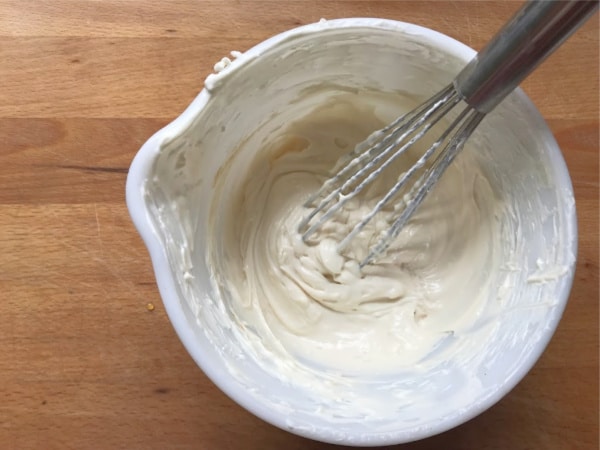 cream cheese and greek yogurt with whisk