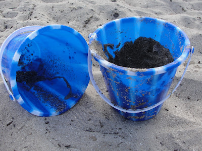 sand buckets on beach