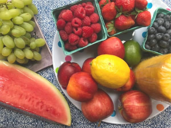 big pile of fruit to use for a fruit tray