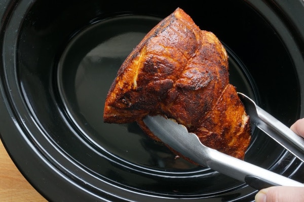 browned pulled pork into slow cooker