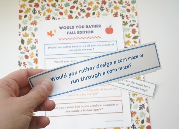 fall theme would you rather questions cut out in hand