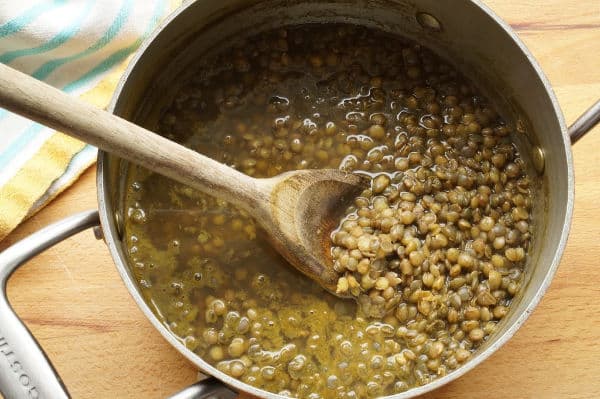 green lentils cooked in a pot