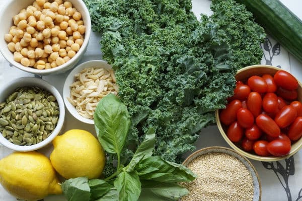 kale salad ingredients on board