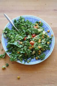 kale salad with pesto and crispy chick peas