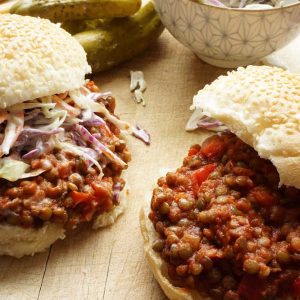 lentil sloppy joe on a bun with slaw
