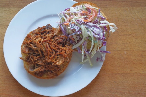 pulled pork on a bun with cole slaw