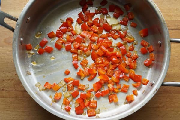 red peppers and onions in skillet