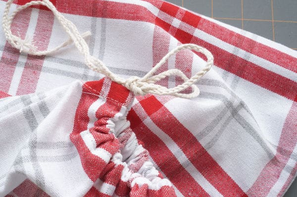 drawstring bag from a tea towel with string knotted