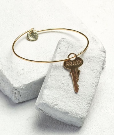 giving key bracelet with key on the bracelet