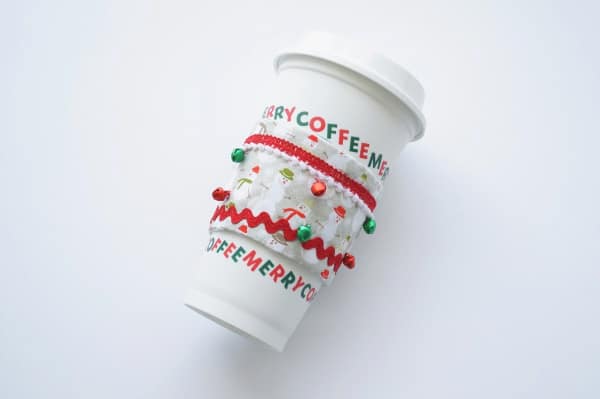 Christmas coffee cup sleeve on coffee cup