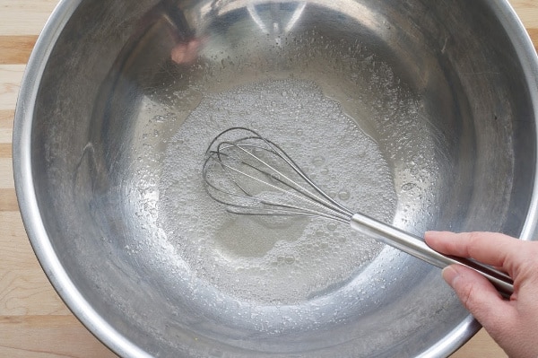 bowl with gelatin and water and a whisk
