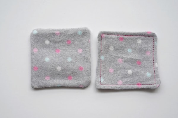 cotton pads sewn around the edge of the square