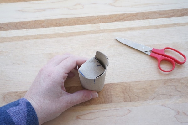 folding the bottom of the toilet paper roll pot