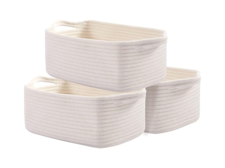 three white woven baskets