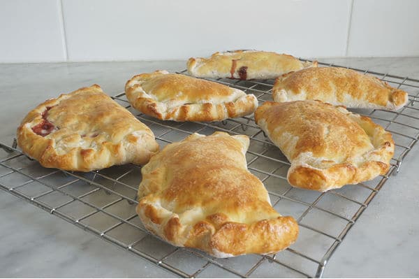 baked sweet calzone recipes on cooling rack