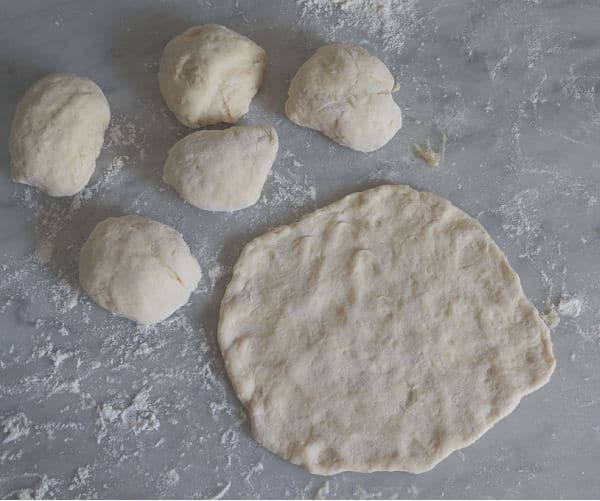 calzone dough recipe divided into 6 pieces