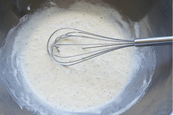 classic creamy coleslaw dressing whisked in bowl