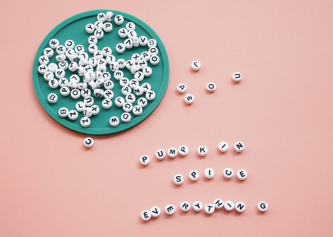 alphabet letter beads on table