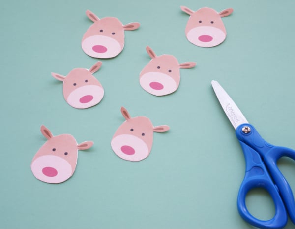 candy cane reindeer faces cutout with scissors