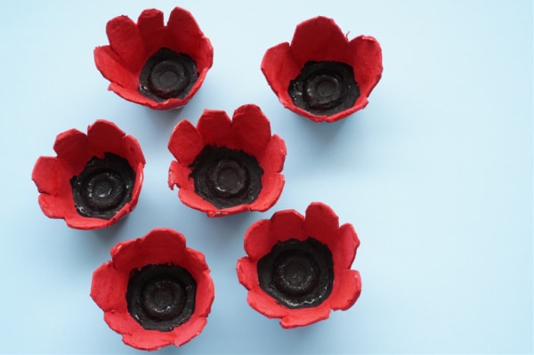 close up of painted poppy flowers made from egg cartons