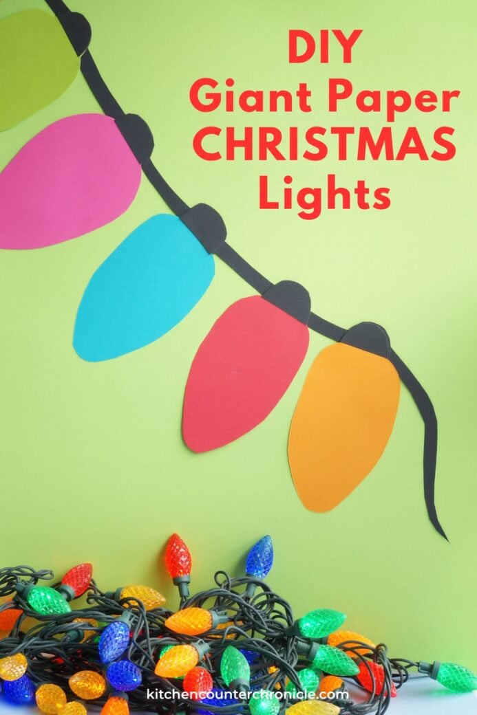 image of giant paper christmas lights hanging on wall