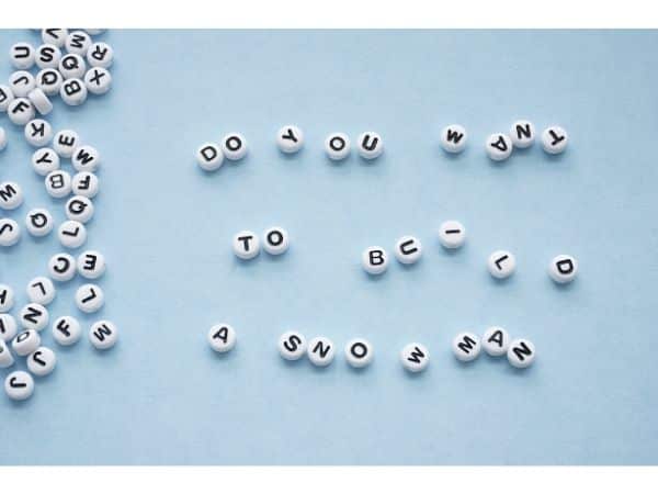 do you want to build a snowman letter beads on table