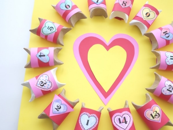 valentines day countdown candy boxes all glued to the board with a heart in the centre