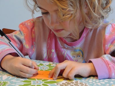 child writing animal memory game cards