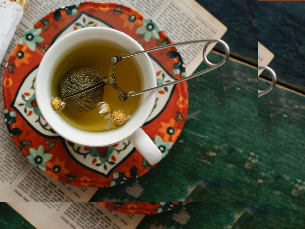 tea ball infuser to make chamomile tea in cup