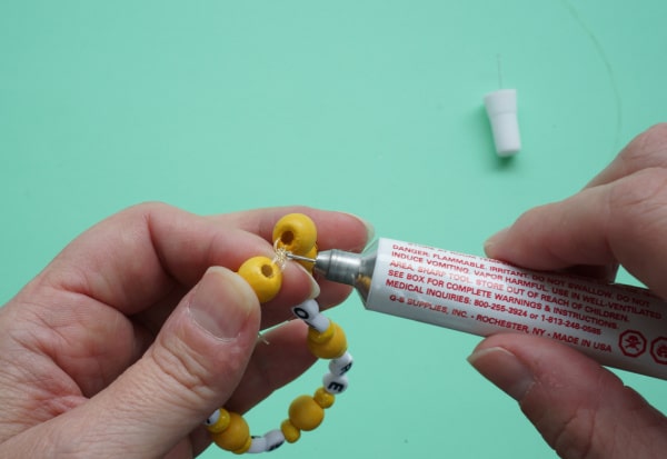 bead glue on bracelet knot